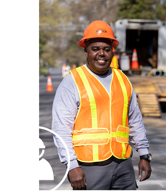 Man in hard hat and orange vest